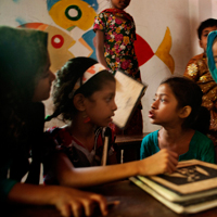 Students from different cultures including Geneva Camp interact with the Bangladeshi students at school.